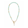 A beaded necklace featuring light mint green round beads, small white pearl-like beads, and scattered gold and brown accent beads, finished with a gold toggle clasp and a dangling white pearl charm, shown on a plain white background.