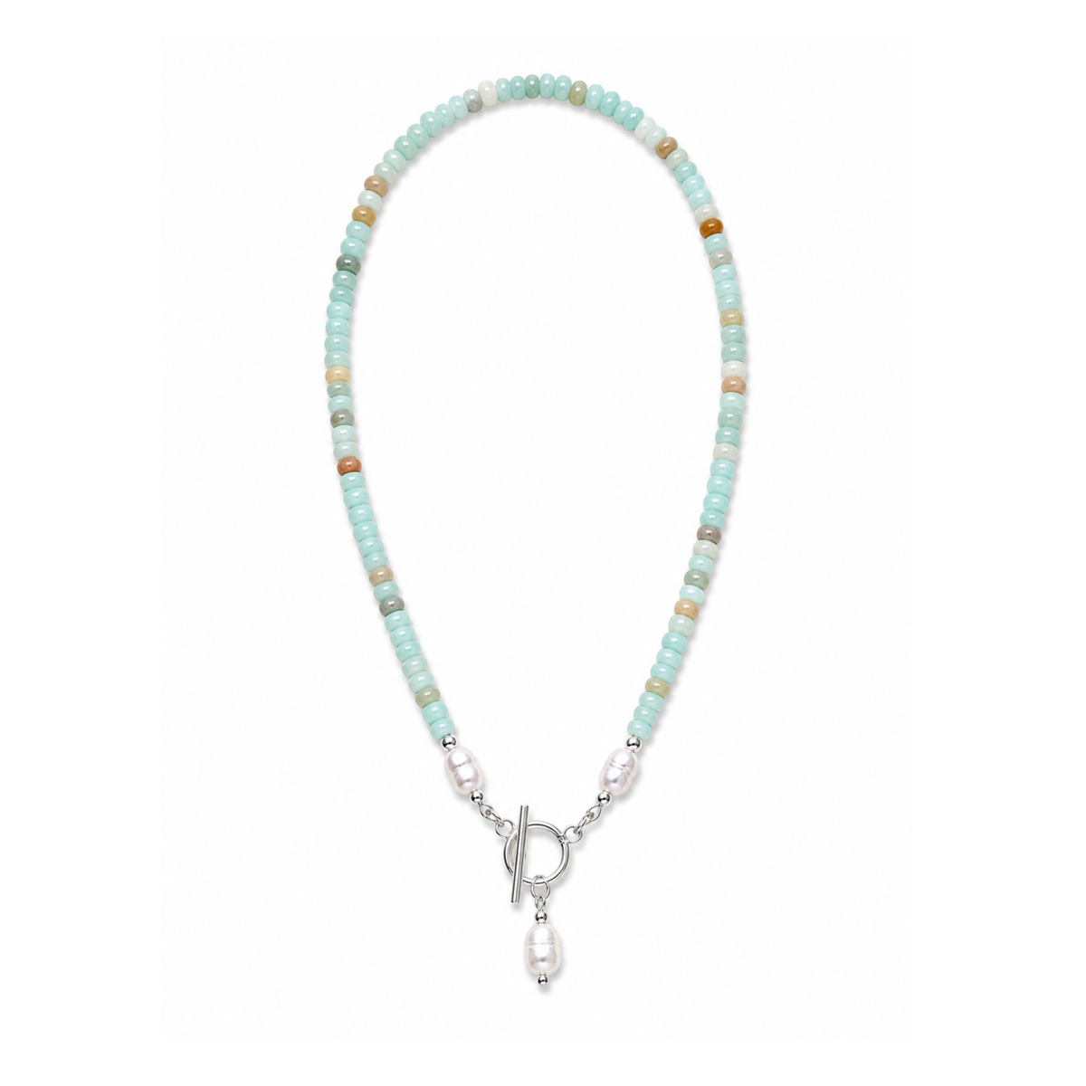 A beaded necklace featuring light blue-green round beads, white pearl-like beads, and a few small brown accent beads, finished with a silver toggle clasp and a dangling white pearl bead.