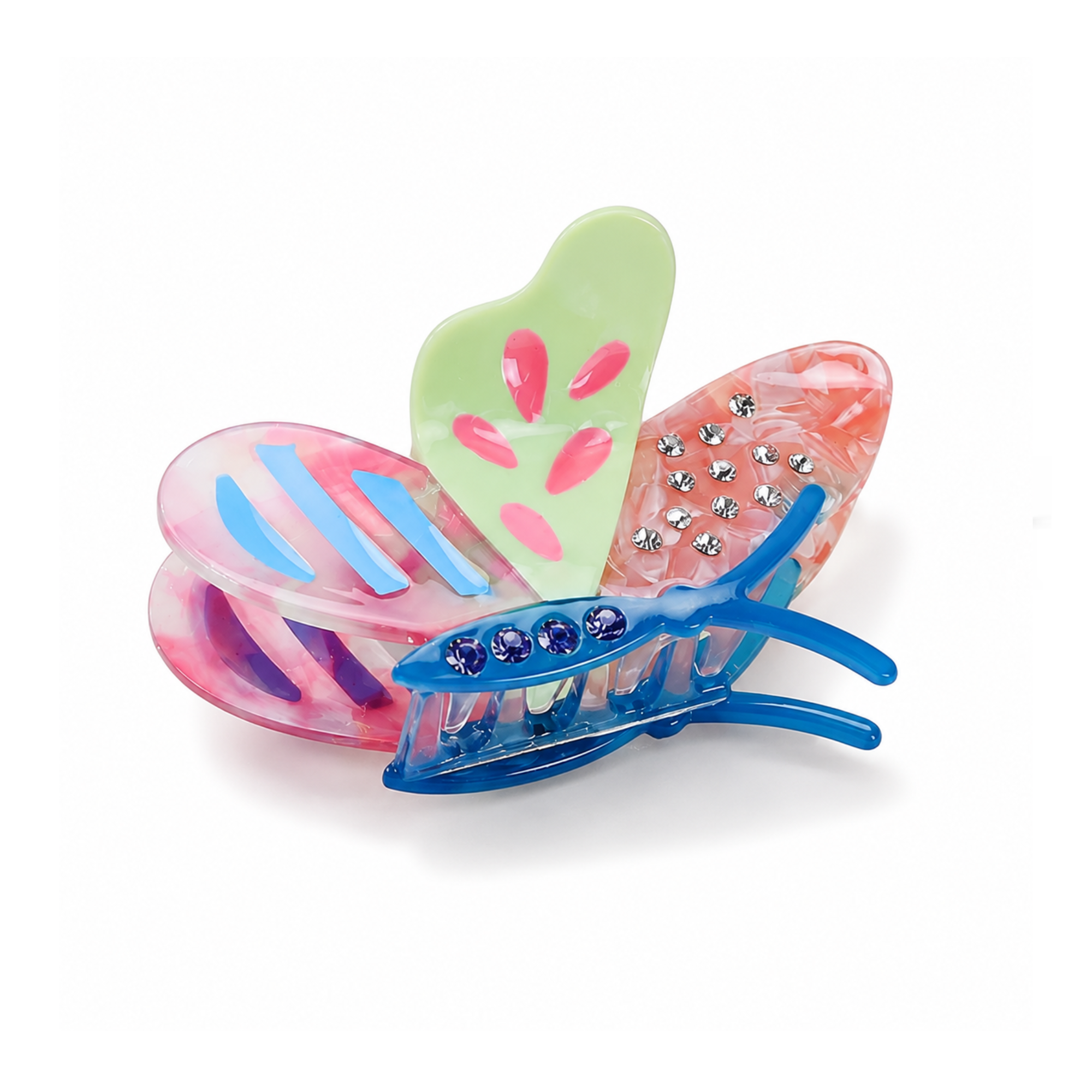 A butterfly-shaped hair claw clip made of translucent acrylic with three wings: one light green with pink spots, one pink with blue stripes, and one coral pink with silver rhinestones, plus a blue top bar with dark blue rhinestones, shown on a white background.