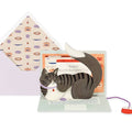 Greeting card with a cat design on a laptop, featuring an envelope with a pattern.