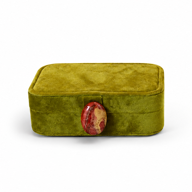 An olive green velvet ring box shown in two views: closed with a red oval clasp on the left, and open with white interior compartments, a mirror on the lid, and a small ring inside on the right, set against a plain white background.